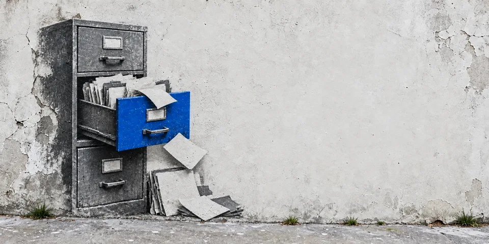 Conceptual mural of an open blue drawer exposing financial records.